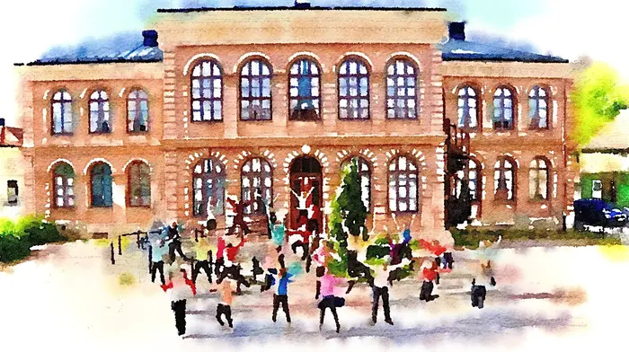 Elever som dansar utanför en skola. 